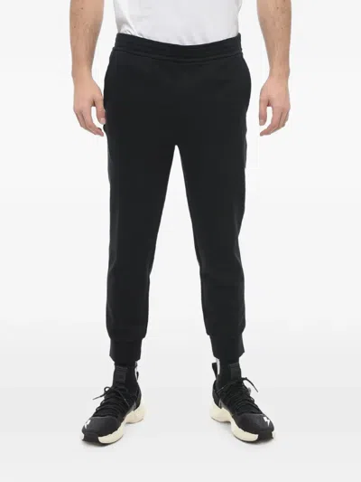 Neil Barrett Logo-embroidered Skinny-fit Track Pants In Black