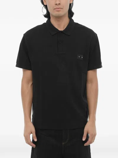 Neil Barrett Piercing-detail Polo Shirt In Black