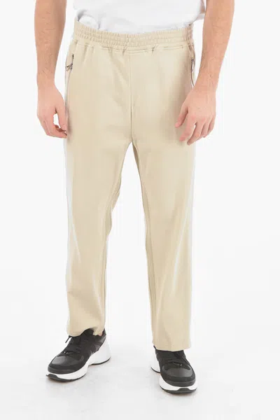 Neil Barrett Regimental Striped Loose Extra Low Rise Sweatpants In Beige