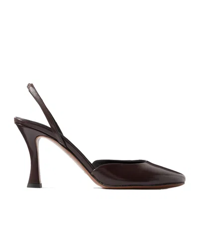 Neous Baten Glossed-leather Slingback Pumps In Brown