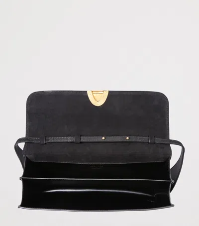 Neous Suede Phoenix Baguette Shoulder Bag In Black