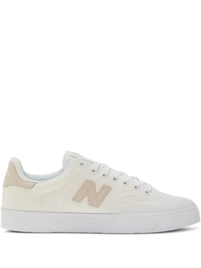 New Balance 100 Canvas Leather Sneakers In White