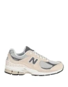 NEW BALANCE NEW BALANCE 2002 WOMAN SNEAKERS BEIGE SIZE 7 TEXTILE FIBERS, LEATHER