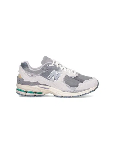 New Balance Layered Mesh And Suede Sneakers With Retro Aesthetic In Gray