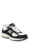 New Balance 2002r Sneaker In Black/ Marsh Green