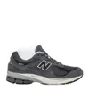 New Balance Women's Dark Sneaker 2002r In Black