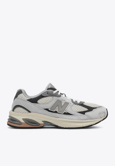 NEW BALANCE 2010 LEATHER AND MESH SNEAKERS