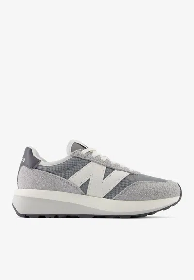 New Balance 370 Low-top Sneakers In Concrete With Sea Salt In Gray