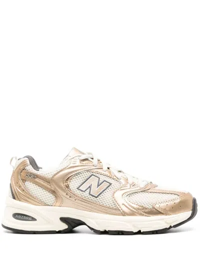 New Balance 530 Metallic Low-top Sneakers In Black/gold/white