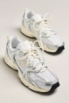 New Balance Mesh Rubber Sole Sneakers With Silver Accents In White