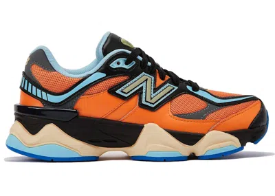 Pre-owned New Balance 9060 Sneakers In Sun Glow/black/team Sky Blue