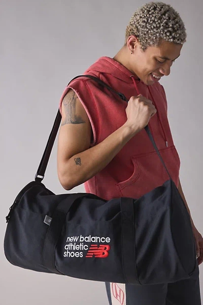 NEW BALANCE CANVAS DUFFLE BAG IN BLACK, MEN'S AT URBAN OUTFITTERS