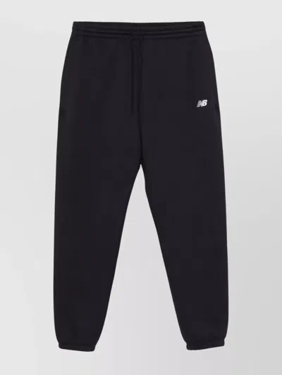 New Balance Comfortable Trousers With Side Pocket Design In Black