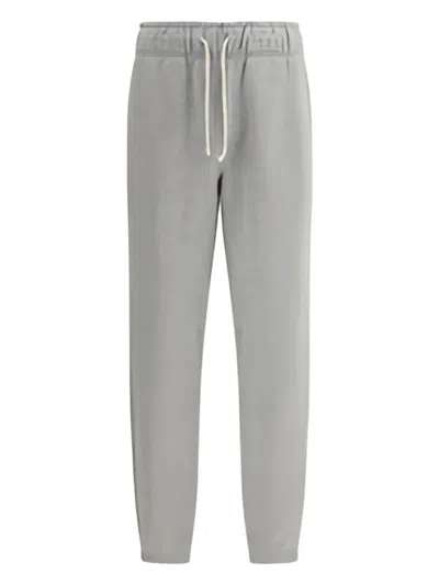 NEW BALANCE ELASTICATED-CUFF TRACK PANTS