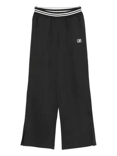 NEW BALANCE ELASTICATED-WAISTBAND SPLIT-HEM TROUSERS