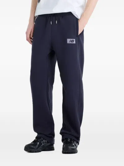 New Balance Embroidered Logo Joggers In Blue