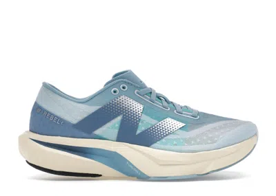 Pre-owned New Balance Fuelcell Rebel V4 (women's) Sneakers In Quarry Blue/chrome Blue/heron Blue
