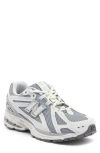 New Balance Gender Inclusive 1906r Running Shoe