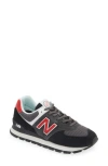 New Balance Gender Inclusive 574 Rugged Sneaker In Black/red