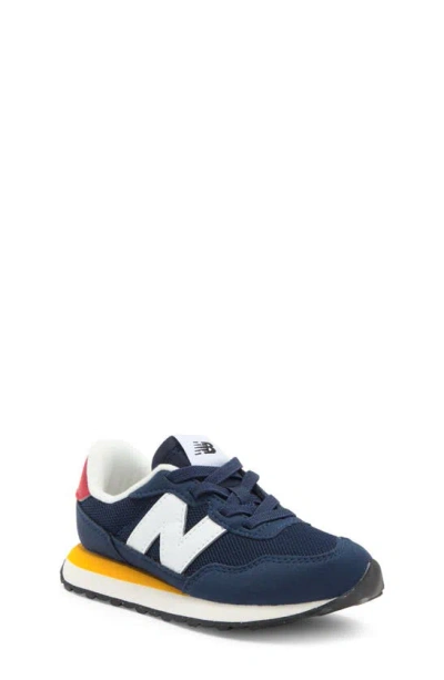 New Balance Kids' 237 Sneaker In Navy/ Varsity Gold
