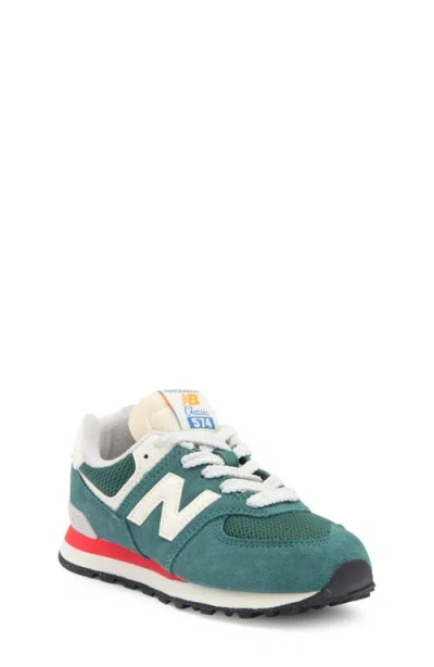 New Balance Kids' 574 Classic Sneaker In New Spruce/blast Red