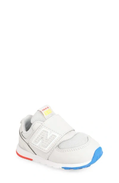 New Balance Kids' 574 New B Sneaker In Grey Matter/lemon Zest