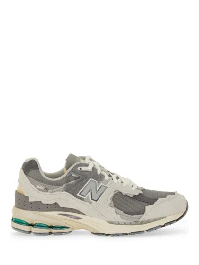 New Balance Layered Mesh And Suede Sneakers With Retro Aesthetic In Gray