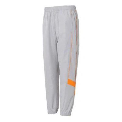 New Balance Lifestyle Track Pants 'grey Orange'