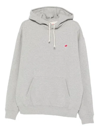 NEW BALANCE LOGO-EMBROIDERED HOODIE