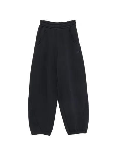 New Balance Logo-embroidered Track Pants In Black