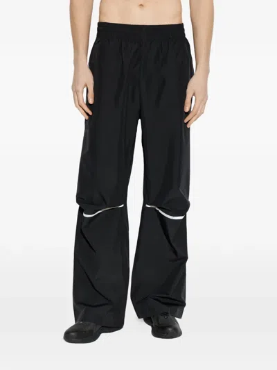 New Balance Logo-print Piping Trousers In Black
