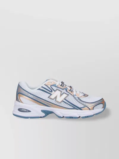NEW BALANCE LOW TOP SNEAKERS WITH CONTRAST ACCENTS AND MESH UPPER