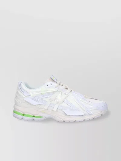 New Balance Low Top Sneakers With Mesh Panels And Reflective Accents In Multi