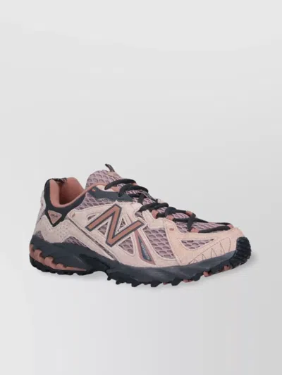 NEW BALANCE LOW TOP SNEAKERS WITH MESH UPPER AND RUBBER SOLE