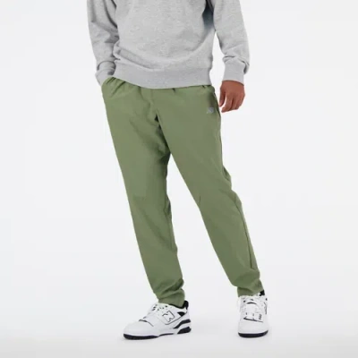New Balance Men's Ac Tapered Pant 31" In Green