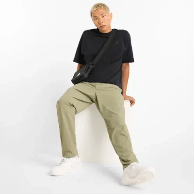 New Balance Men's Athletics Ripstop Standard Tapered Pant 30" In Green
