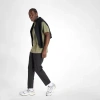 New Balance Men's Athletics Standard Tapered Pant 30" In Black
