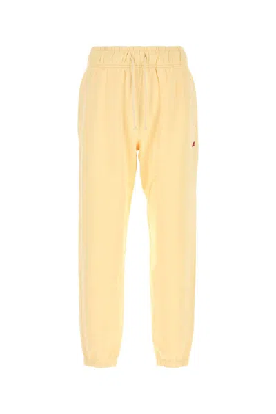 New Balance Pastel Yellow Cotton Joggers In Orange
