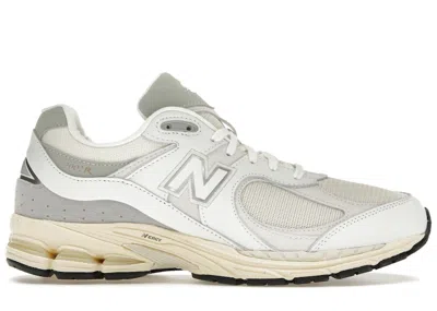 Pre-owned New Balance Men's  2002r Gold Sneakers In White/reflection/gold Metallic