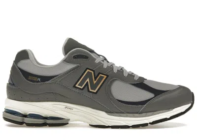Pre-owned New Balance Men's  2002r Sneakers In Castlerock/eclipse/gold Metallic In Multi