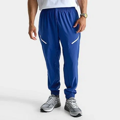 New Balance Men's Reimagined Woven Track Pants In Blue