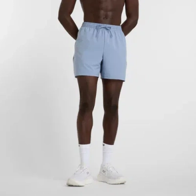 New Balance Men's Sport Essentials Short 5" In Blue