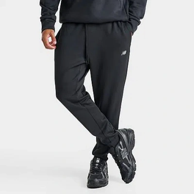 New Balance Men's Tech Knit Pants In Black