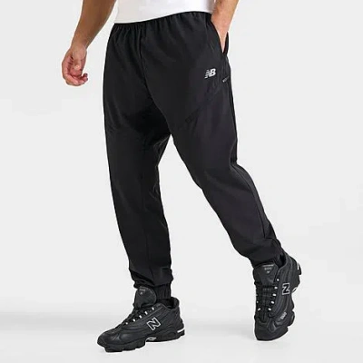 New Balance Men's Woven Zip Pocket Jogger Pants In Black