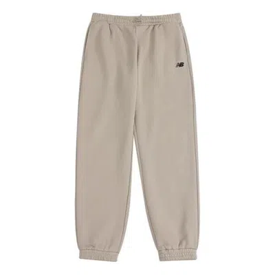 New Balance Nb Logo Woven Jogger 'beige' In Neutral