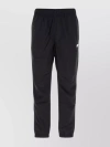 NEW BALANCE NYLON JOGGERS WITH ELASTIC WAIST AND CUFFS