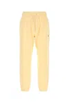 New Balance Cotton Trousers With Elastic Cuffs And Waistband In Yellow
