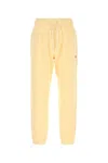 New Balance Cotton Trousers With Elastic Cuffs And Waistband In Yellow
