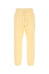 New Balance Cotton Trousers With Elastic Cuffs And Waistband In Yellow