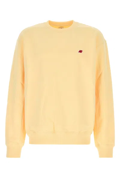 NEW BALANCE NEW BALANCE PASTEL YELLOW COTTON SWEATSHIRT